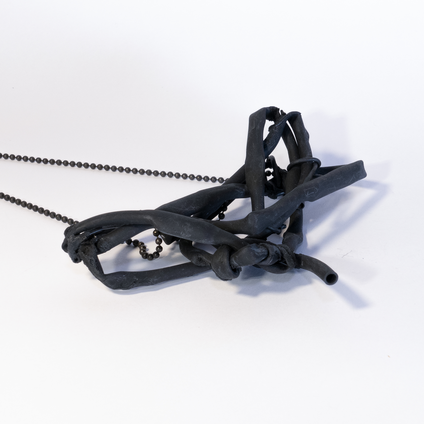 Black silver necklace with a sling pendant in black made from tubes