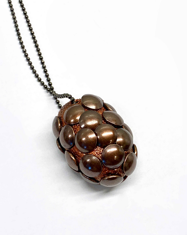 Black rhodium-plated silver necklace with bronze-coloured silk cocoon, pierced which many bronze-coloured semicircular nails 