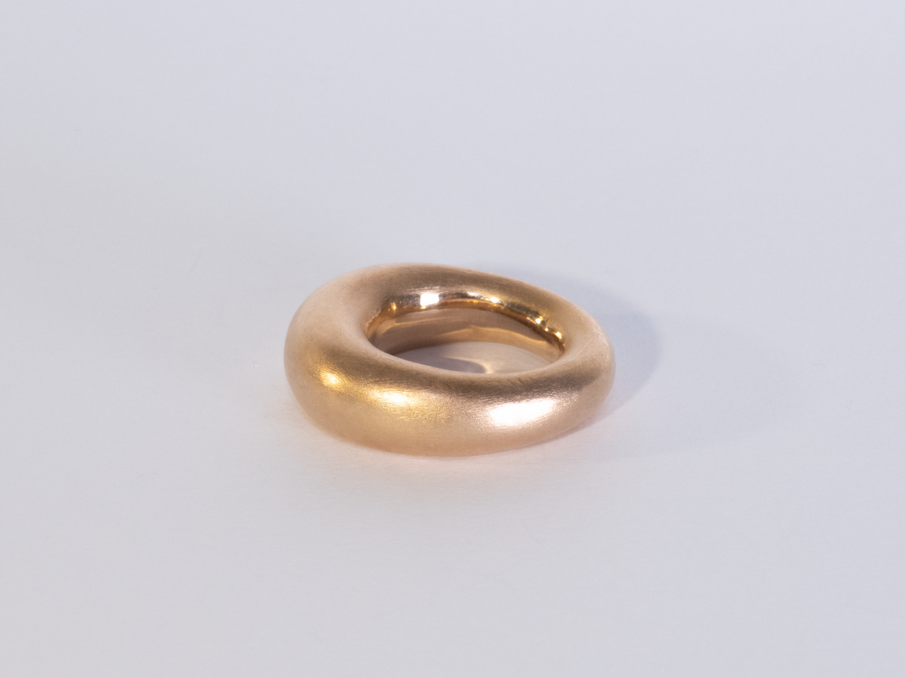"The One" Golden heavy ring thicker at the top edge than at the bottom