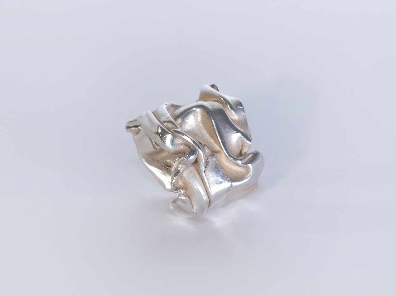 "Tiny Foil" Curved open silver ring with that looks like a thick crushed foil