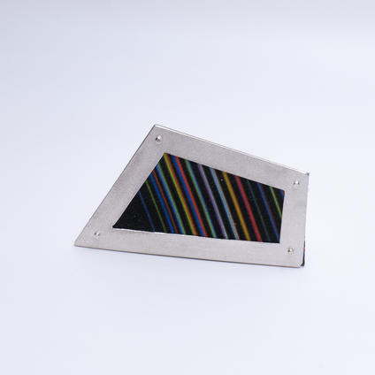 Irregular angular brooch with a silver frame and canvas in colourful fine stripes, it looks like a framed picture
